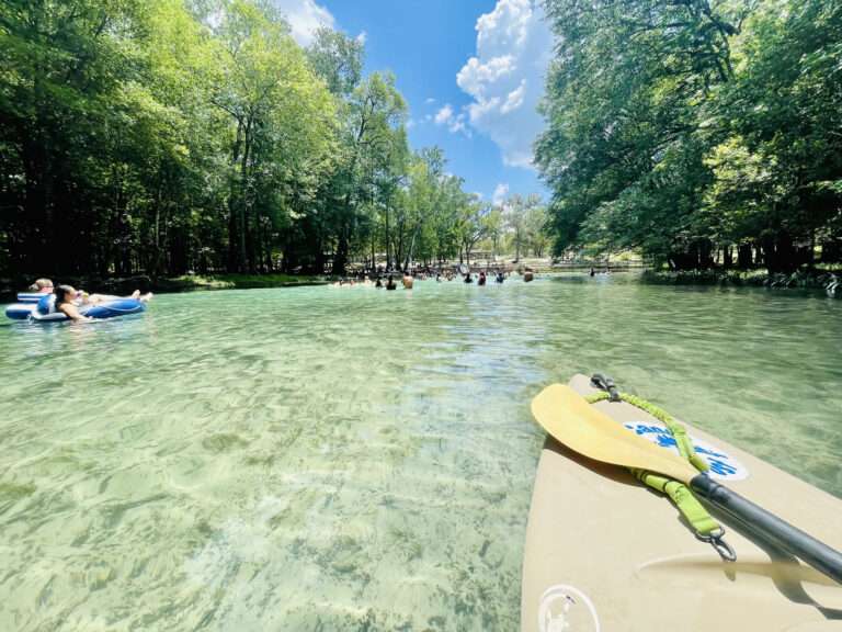 Kayakers, tubers, and swimmers at Gilchrist Blue Springs State Park